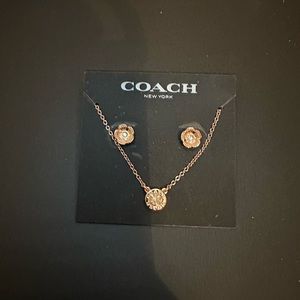 Coach rose gold brass crystal necklace and matching flower earring set